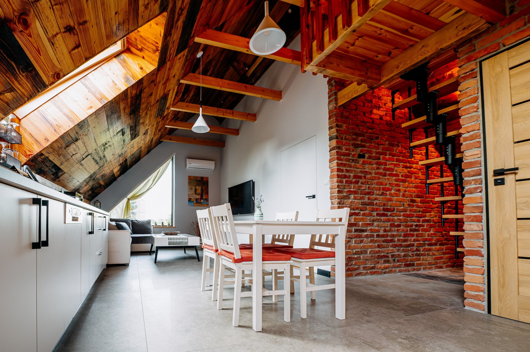 white concrete building near green grass field during daytime