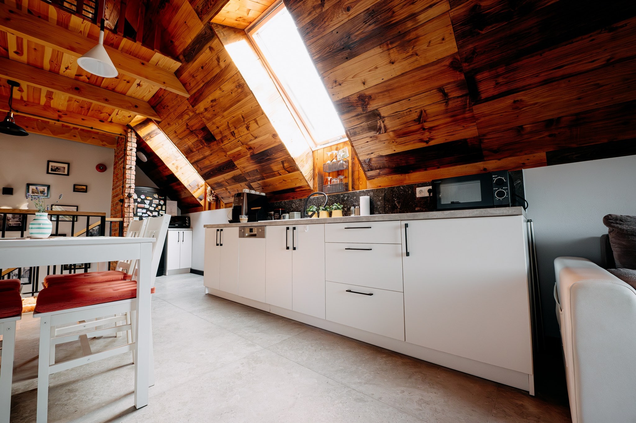 white concrete building near green grass field during daytime